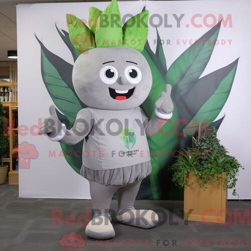 Personnage Mascotte Redbrokoly D Un Trèfle À Quatre Feuilles Rose Habillé D Un Pantalon Cargo Et De Sacs Fourre-Tout