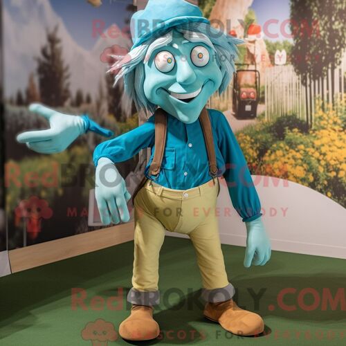 Personnage Mascotte Redbrokoly D Un Épouvantail Cyan Habillé D Un Pantalon De Jogging Et De Bretelles
