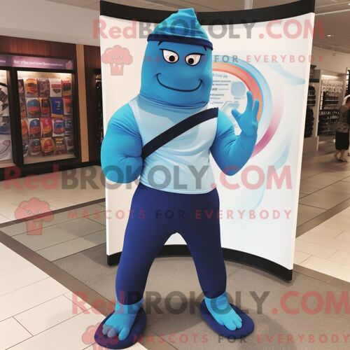Personnage Mascotte Redbrokoly D Un Ballon De Rugby Bleu Habillé D Une Jupe-Culotte Et De Besaces