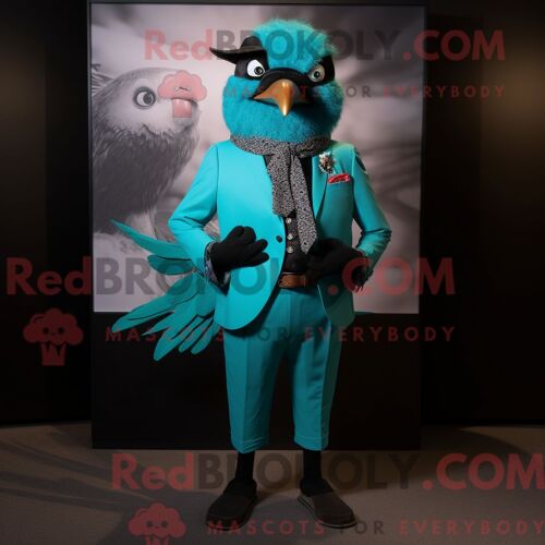 Costume Mascotte Redbrokoly De Merle Turquoise Personnage Habillé D Un Blazer Et De Bracelets