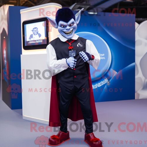 Costume Mascotte Redbrokoly De Vampire Bleu Marine Habillé D Une Chemise En Popeline Et De Montres Connectées