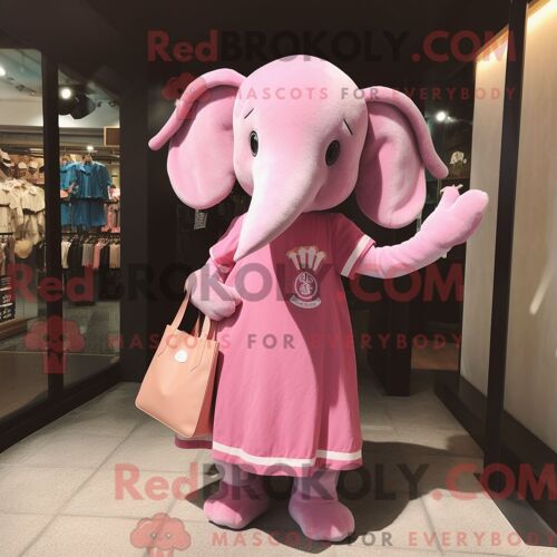 Personnage De Costume De Mascotte Redbrokoly D Éléphant Rose Habillé Avec Une Robe Fourreau Et Des Sacs Fourre-Tout
