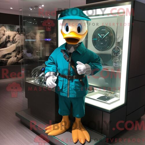 Costume Mascotte Redbrokoly De Canard Bleu Sarcelle Habillé D Un Coupe-Vent Et De Montres-Bracelets