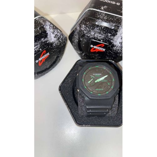 Montre G-Shock Modèle Ga-2100. Gshock Couleur Noir Avec Les Aiguilles Vertes.
