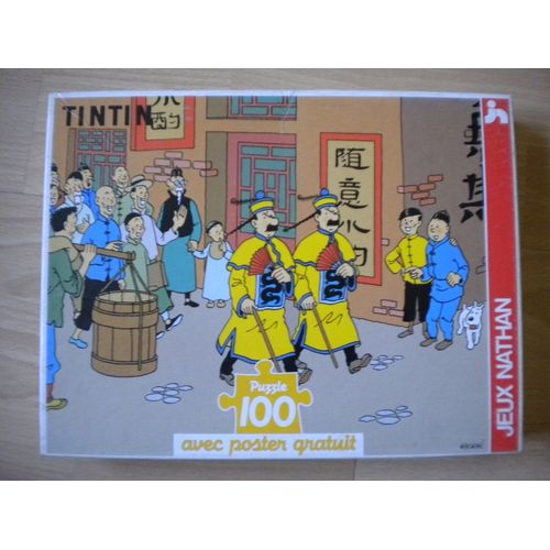 Tintin et le Lotus Bleu - puzzle 100 pièces représentant les Dupond et Dupont et Tintin