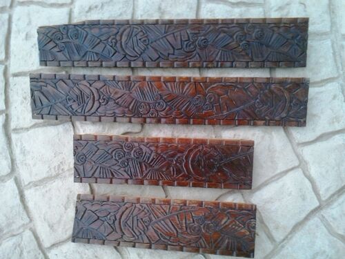 4 pièces de bois sculpté style art déco.