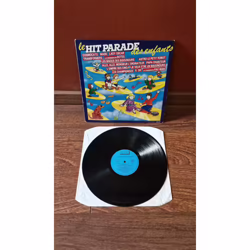 Le Hit Parade Des Enfants 33 Tours - Cosmocats - Mask - Lady Oscar - Les Bisous Des Bisounours - Transformers - La Chanson Des Botes - L'Empire Des Cinq - Astro Le Petit Robot - X Or - Les Champignoux