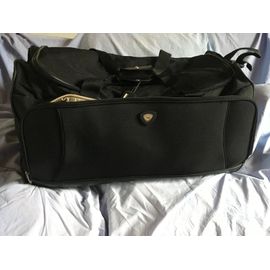 Tres tres grand sac de voyage sur roulettes noir