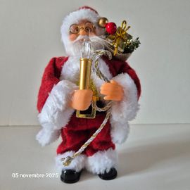 Père Noel lumineux et chanteur , fonctionne à piles, R6 x 2