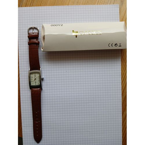 Montre Lip Avec Plastiques De Protection. Bracelet En Cuir Marron