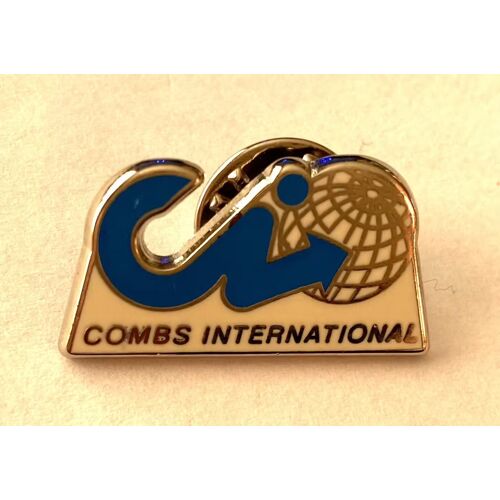 Pins Combs International Globe Terrestre / Base Argentée