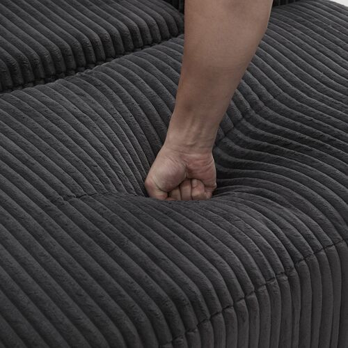 Fauteuil surdimensionné avec étriers en velours côtelé poches latérales et coussins assise profonde rembourré moderne moelleux gris foncé