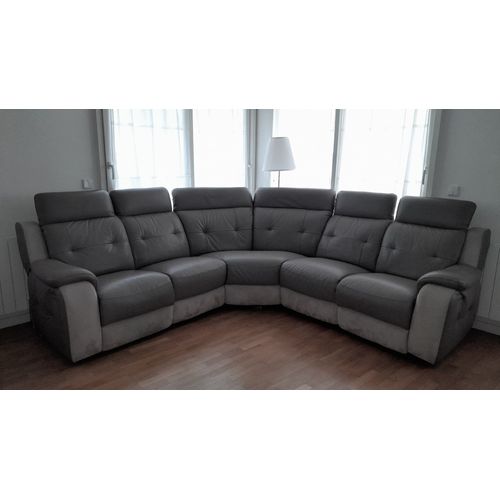 Je vend un canapé d'angle 6 places avec deux fauteuils basculant à chaques extrémité par commande électrique