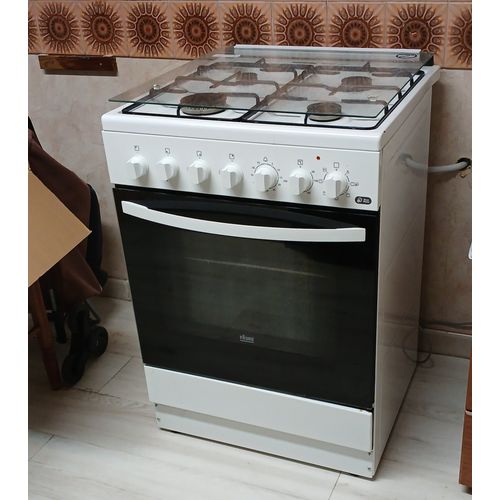 Cuisiniére Gaz four électrique FAURE sous garantie