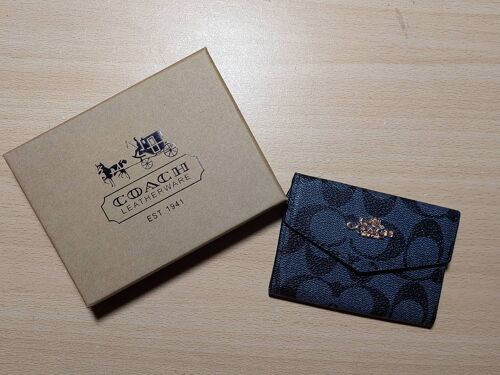 Porte monnaie coach