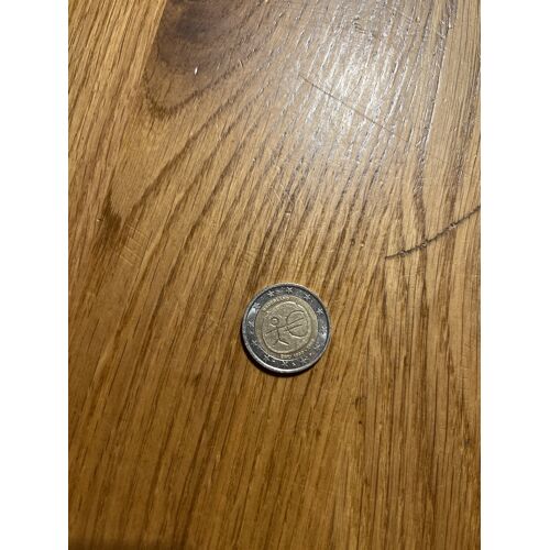 Pièce De 2€ Rare Des 10 Ans De L’Uem Avec Le Bonhomme En Bâtons
