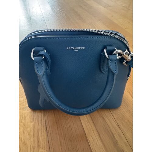 Sac Le Tanneur porte main avec bandoulière couleur bleu pétrole en cuir