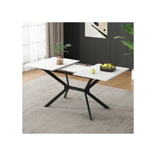 Table à rallonges blanche, 120/160 × 80 cm, avec pieds en métal noir, pouvant accueillir quatre à six personnes.