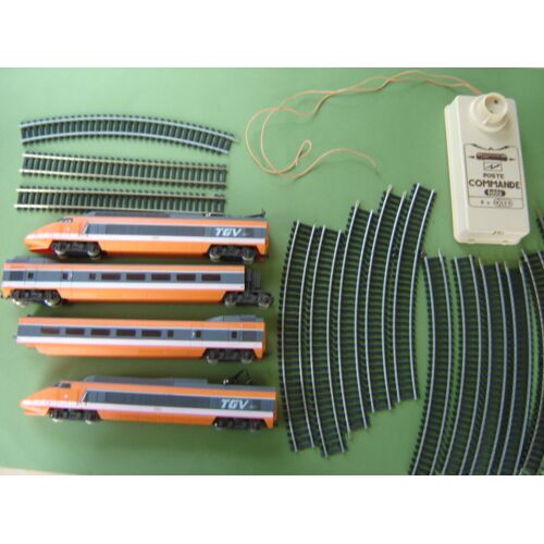 Train TGV FOBBI * 2 motrices*2 wagons*boite d'alimentation* 14 rails . A Tester