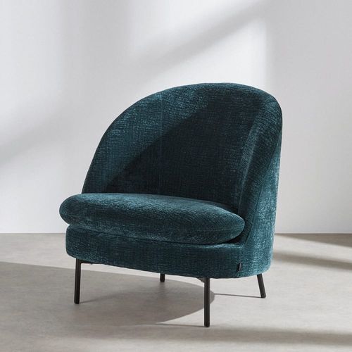 Fauteuil en tissu texturé bleu pétrole