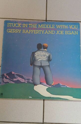 Stuck In The Middle With You. Gerry Rafferty And Joe Egan.The Best Of Stealers Wheel. Album Vinyle Rare Am Records Amlh 64708.