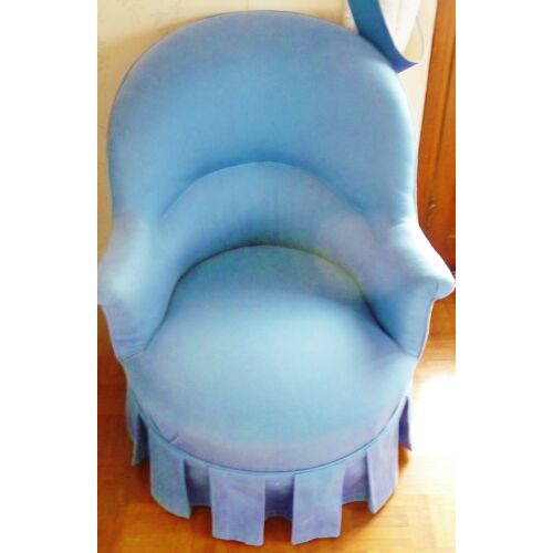 Fauteuil crapaud recouvert de tissus
