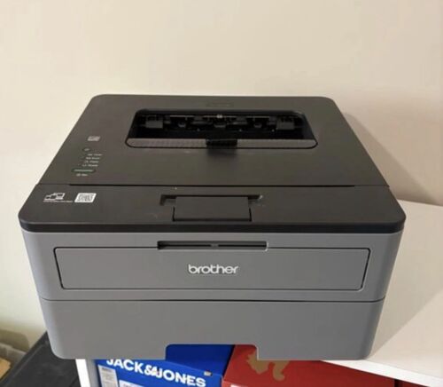 Imprimante Brother HL L2310D qui marche parfaitement il faut acheter une cartouche d’encre elle ne fonctionne que sur PC avec un cable. Tres bon matériel.