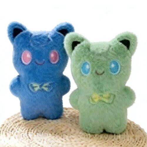 Peluche enfant aux grands yeux souriants 21 cm (Modèle aléatoire)