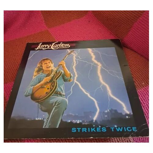 Larry Carlton "Strikes Twice"