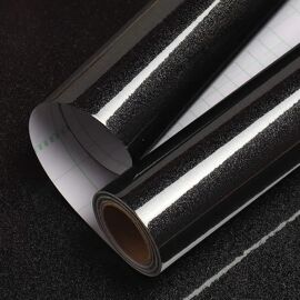 Film adhésif pour meuble PVC noir brillant effet glitter imperméable lavable 40x1000 cm avec grille au dos pour cuisine salle de