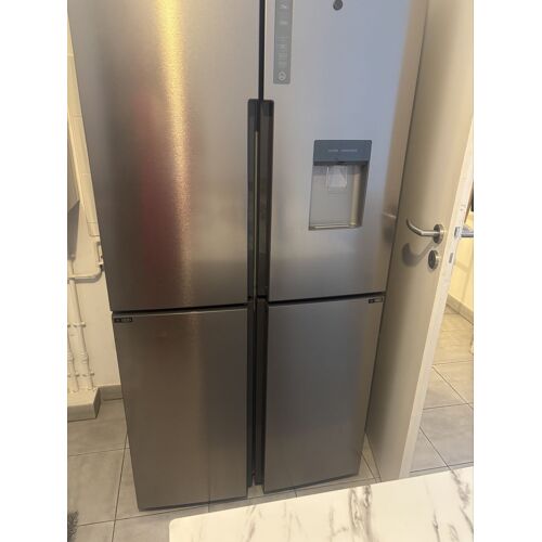Réfrigérateur Haier 4 portes Inox avec distributeur d¿eau ¿ État neuf ¿ Acheté en 2024