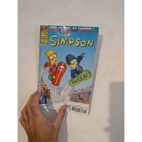 Bande Dessinée Les Simpson Comics Duel De Surf Au Sommet Tome 32