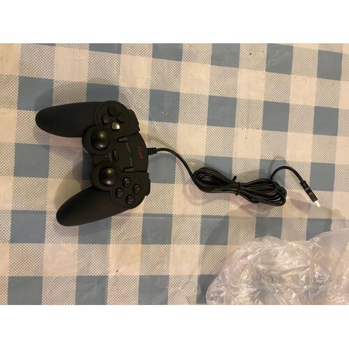 Manette de jeu filaire Free ¿ neuve, jamais utilisée