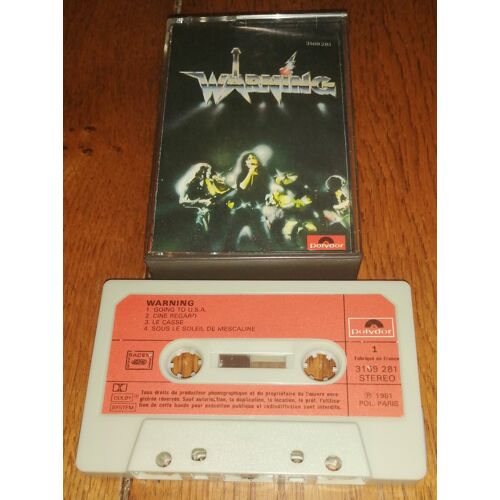 K7 Cassette Audio Tape Warning " Going To Usa ,Ciné Regards ,Sous Le Soleil De Mescaline , New Look ,Tel Que Tu L'Imaginais ....." 8 Titres De 1981 Rock Heavy Métal Polydor 3169 281 Label Papier Rouge