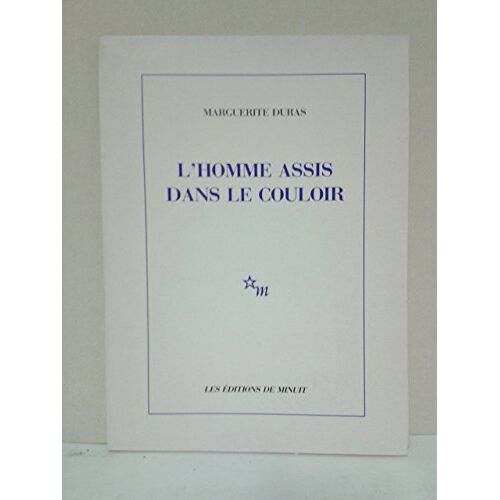 L'Homme Assis Dans Le Couloir