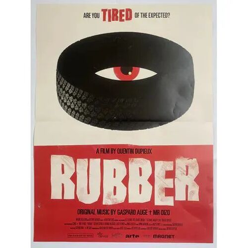 Rubber - Affiche De Cinéma Pliée - Format 40x53 Cm - De Quentin Dupieux Avec Stephen Spinella, Roxane Mesquida, Jack Plotnick - 2010